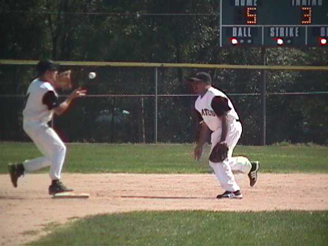 Greg Rivera tosses to Dave Lohr